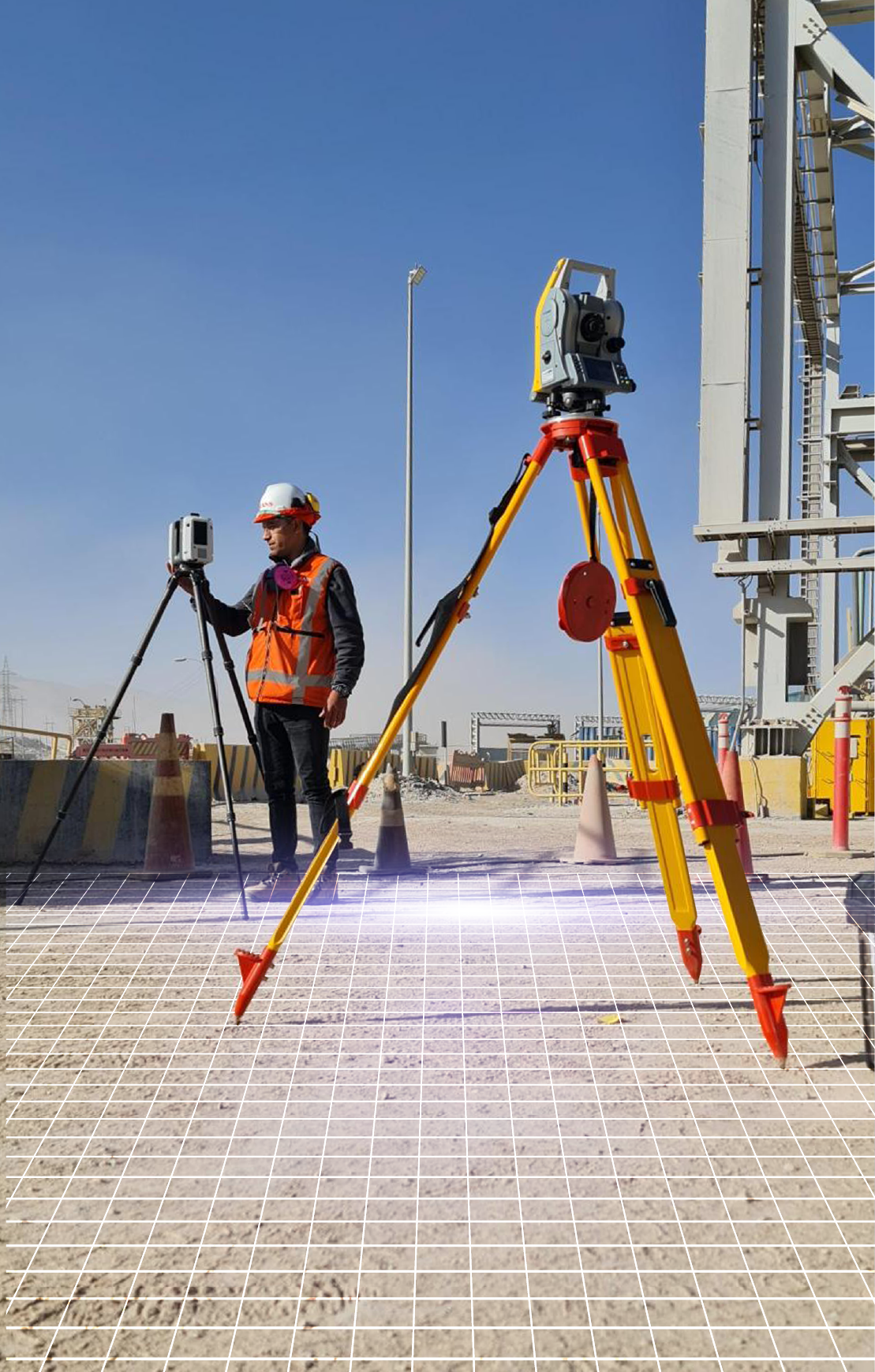 Equipamiento avanzado y técnico experto en topografía en medio de una zona de maquinaria y cañerías